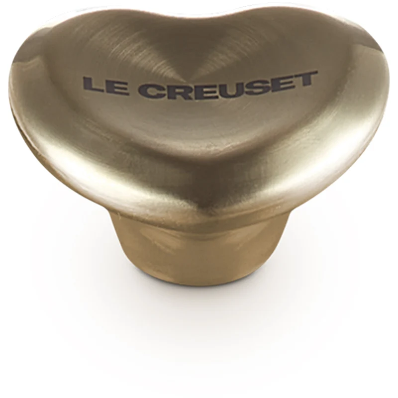 Le Creuset Herzknopf goldfarben